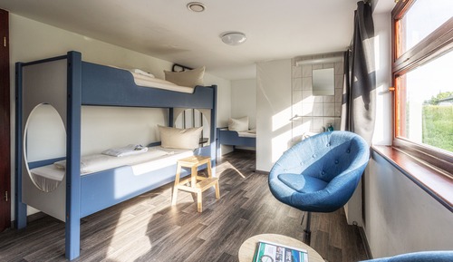 Habitación económica, varias camas