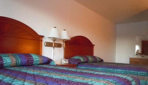 Habitación Deluxe doble, 2 camas de matrimonio, cocina básica