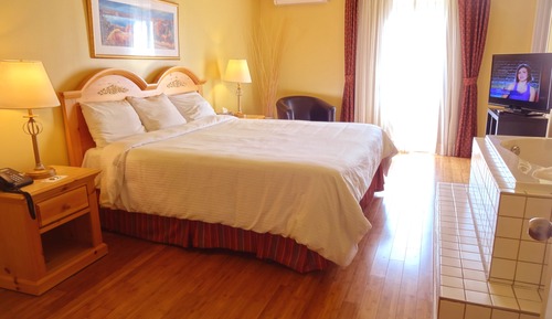 Habitación Signature, 1 cama de matrimonio grande, bañera de hidromasaje