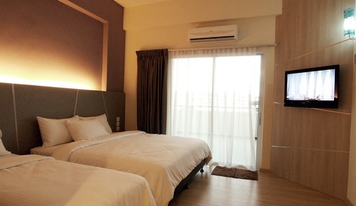 Habitación triple Deluxe