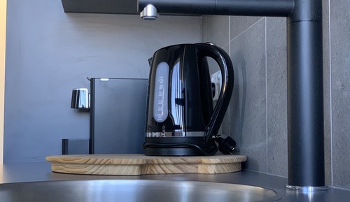 Habitación Deluxe, 1 cama de matrimonio grande, cocina básica, vistas parciales al mar