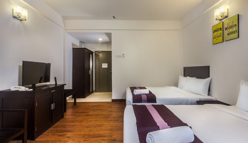 Habitación cuádruple Deluxe, vistas al jardín