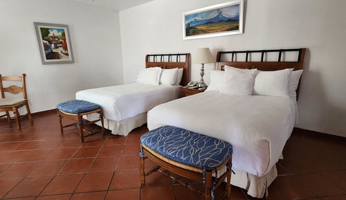 Suite Deluxe, 2 camas de matrimonio, vistas al patio