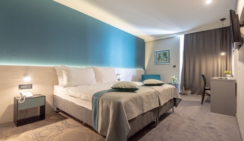 Habitación superior con 1 cama doble o 2 individuales