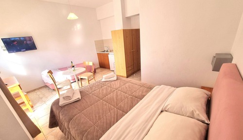 Habitación triple, vistas al jardín