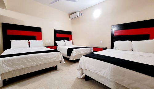 Habitación triple familiar, varias camas