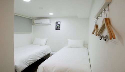 Habitación con 2 camas individuales