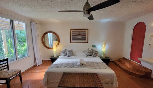 Habitación triple Elite, 2 habitaciones, vistas al jardín