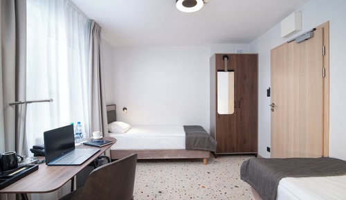 Habitación clásica con 2 camas individuales