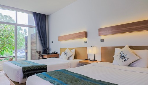 Habitación Deluxe con 2 camas individuales, vistas al jardín