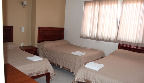 Habitación superior, varias camas