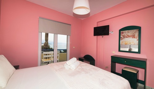 Habitación triple, vistas al mar