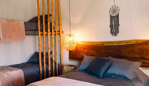 Habitación junior con 1 cama doble o 2 individuales