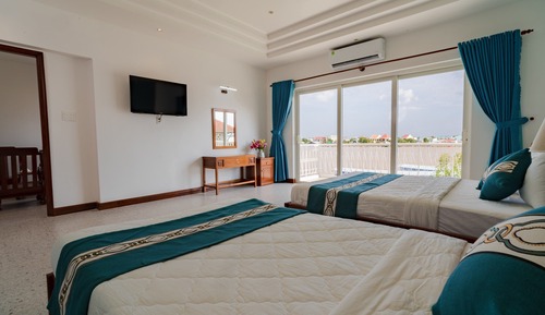 Habitación triple Deluxe
