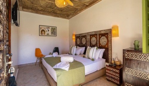 Habitación superior con 1 cama doble o 2 individuales