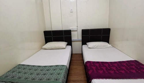 Habitación con 2 camas individuales
