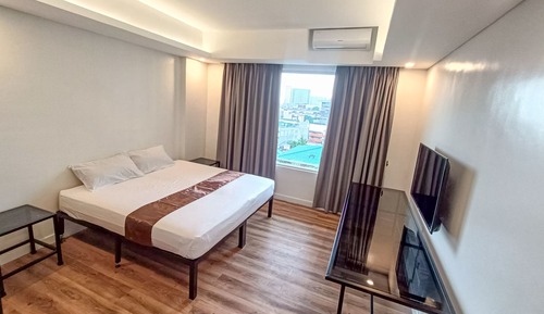 Habitación clásica, 2 camas individuales, baño privado, vistas a la ciudad