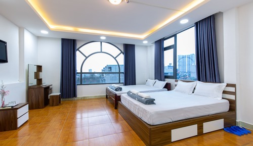 Habitación familiar, 2 camas dobles, vistas a la ciudad