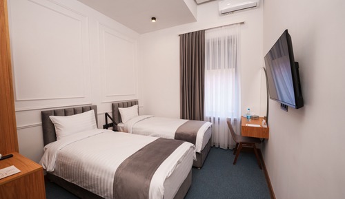 Habitación estándar con 1 cama doble o 2 individuales