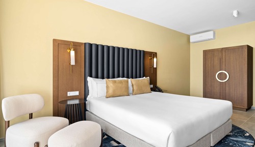 Habitación Deluxe, 1 cama de matrimonio grande, vistas parciales al mar
