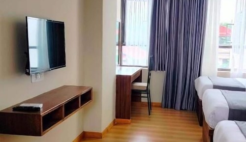 Habitación triple Deluxe