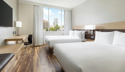Habitación Deluxe, 2 camas de matrimonio, bañera accesible, vistas a la ciudad