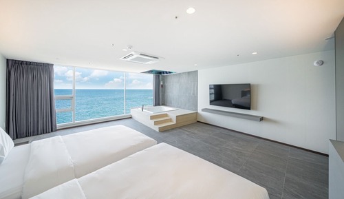Habitación Deluxe doble, 2 camas dobles, no fumadores, vistas al mar