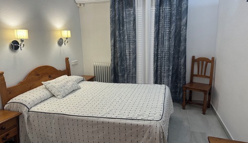 Habitación superior con 1 cama doble o 2 individuales