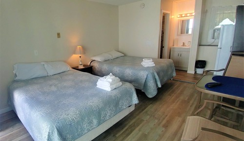 Habitación Signature doble, 2 camas de matrimonio, vistas al mar