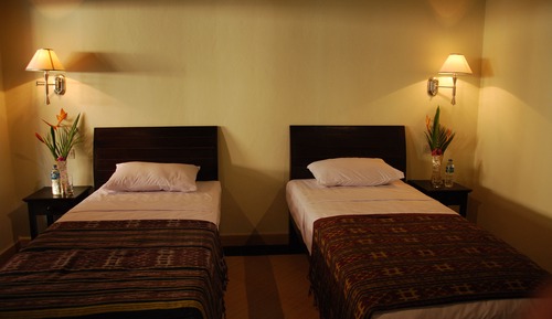 Habitación estándar con 1 cama doble o 2 individuales