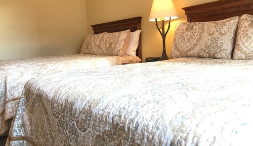 Suite Premier, 2 camas dobles, baño privado, en esquina