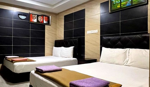 Habitación cuádruple Deluxe