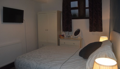Habitación estándar con 1 cama doble o 2 individuales, baño privado
