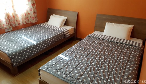 Habitación con 2 camas individuales
