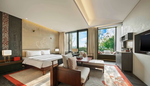 Habitación Deluxe, 1 cama de matrimonio grande, Acceso al salón del club, vistas al jardín