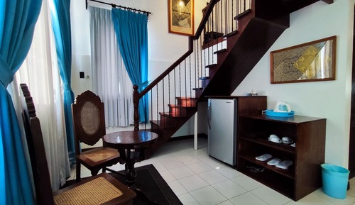 Habitación triple, en la zona del jardín