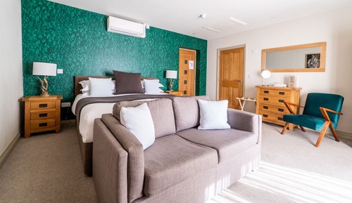 Suite Deluxe, accesible para personas con discapacidad, vistas al jardín