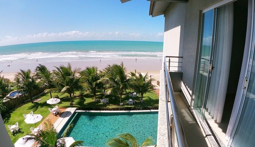Habitación triple, vistas parciales al mar