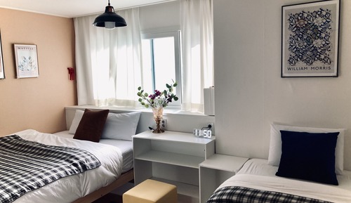 Habitación familiar con 2 camas individuales