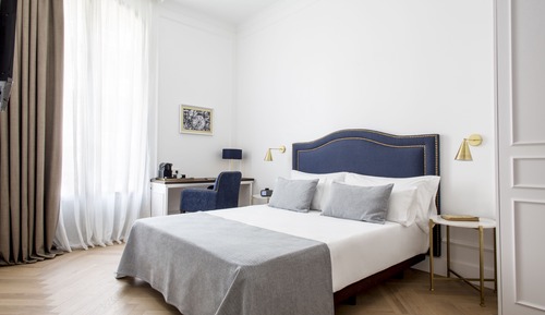 Habitación superior con 1 cama doble o 2 individuales