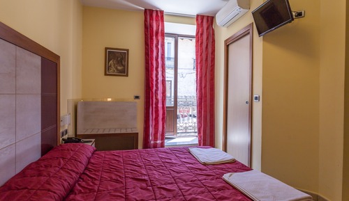 Habitación Confort con 1 cama doble o 2 individuales