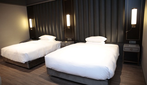 Habitación, varias camas