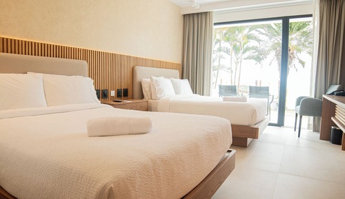 Habitación Deluxe con 2 camas individuales, balcón, vistas al mar