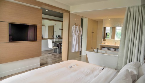 Suite ejecutiva, 1 cama de matrimonio grande con sofá cama, vistas al campo de golf