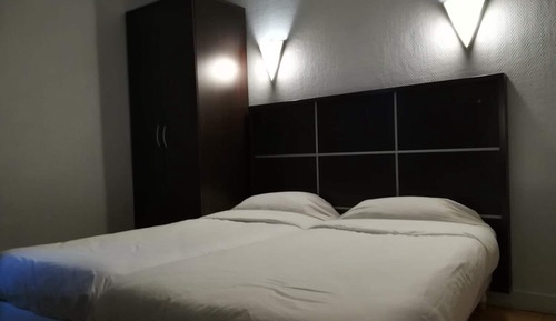 Habitación con 2 camas individuales