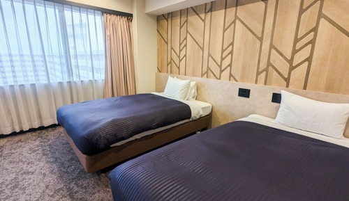 Habitación triple, fumadores