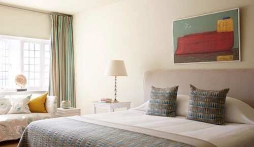 Habitación superior con 1 cama doble o 2 individuales, vistas al mar
