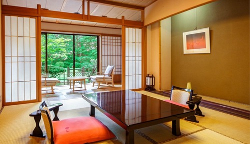 Habitación cuádruple Deluxe, vistas al jardín