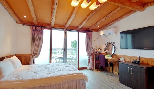 Habitación doble, vistas al mar (52 sqm.)