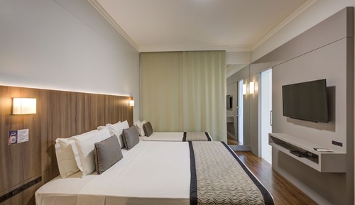 Habitación triple familiar, varias camas